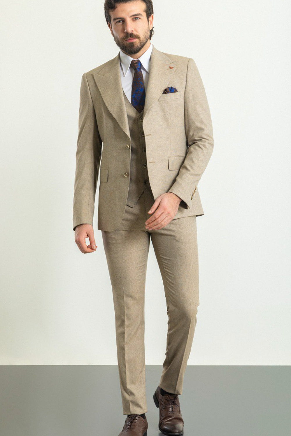 Light brown tailored suit by Mazonni with classic fit, ideal for office or special occasions