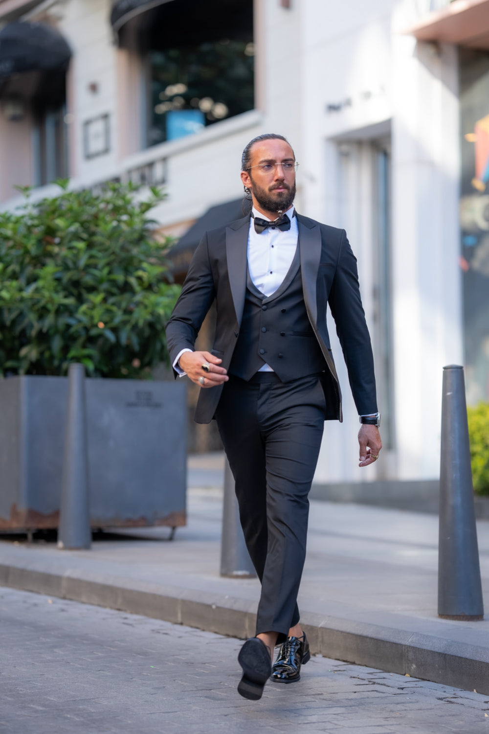 Mazonni black tuxedo with satin lapels and white shirt, formal evening menswear