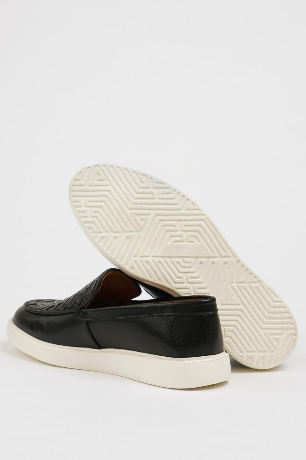 Stylish black leather loafers by Mazonni with textured design and lightweight sole