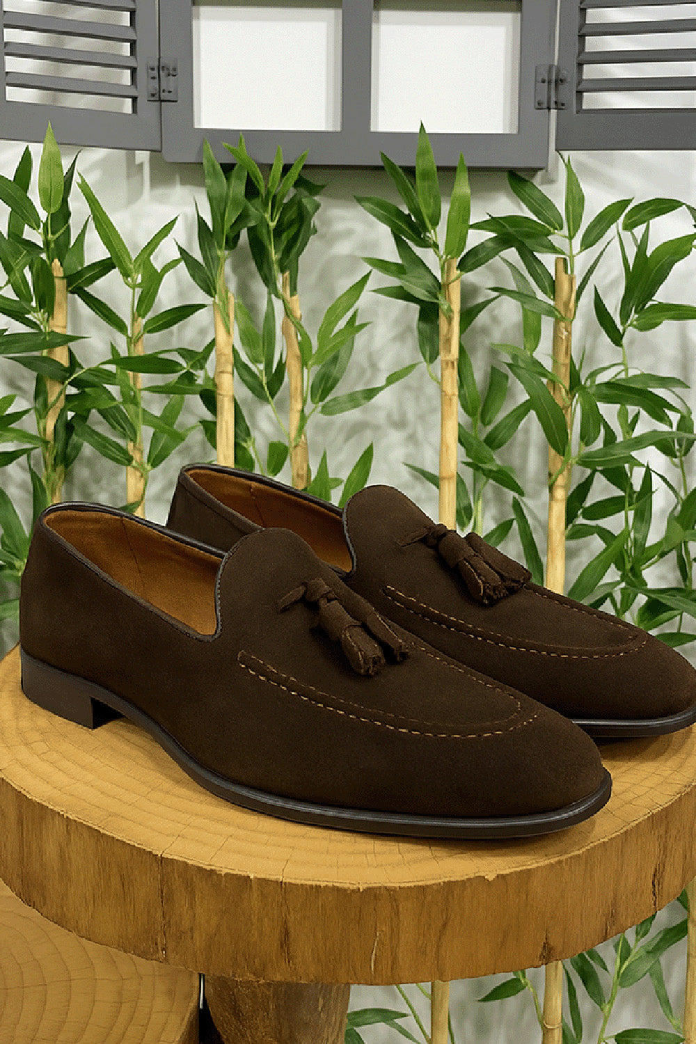 Brown suede tassel loafers for men by Mazonni with classic silhouette and leather sole