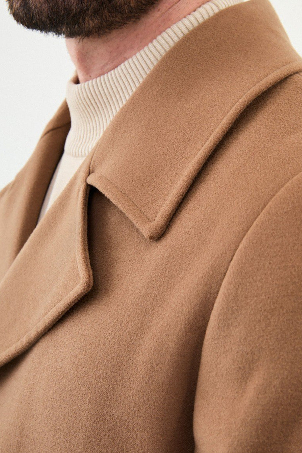 Light brown wool pea coat by Mazonni for men featuring wide lapels and tailored fit
