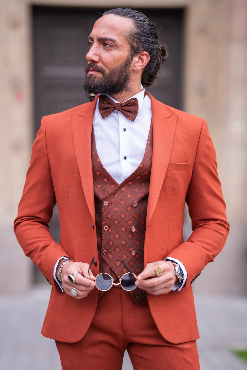 Mazonni burnt orange formal suit with matching waistcoat and white shirt for elegant modern menswear