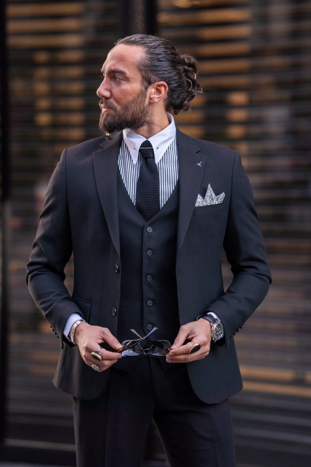 Stylish black slim-fit suit for men from Mazonni featuring a pocket square and tie, ideal for weddings and office wear