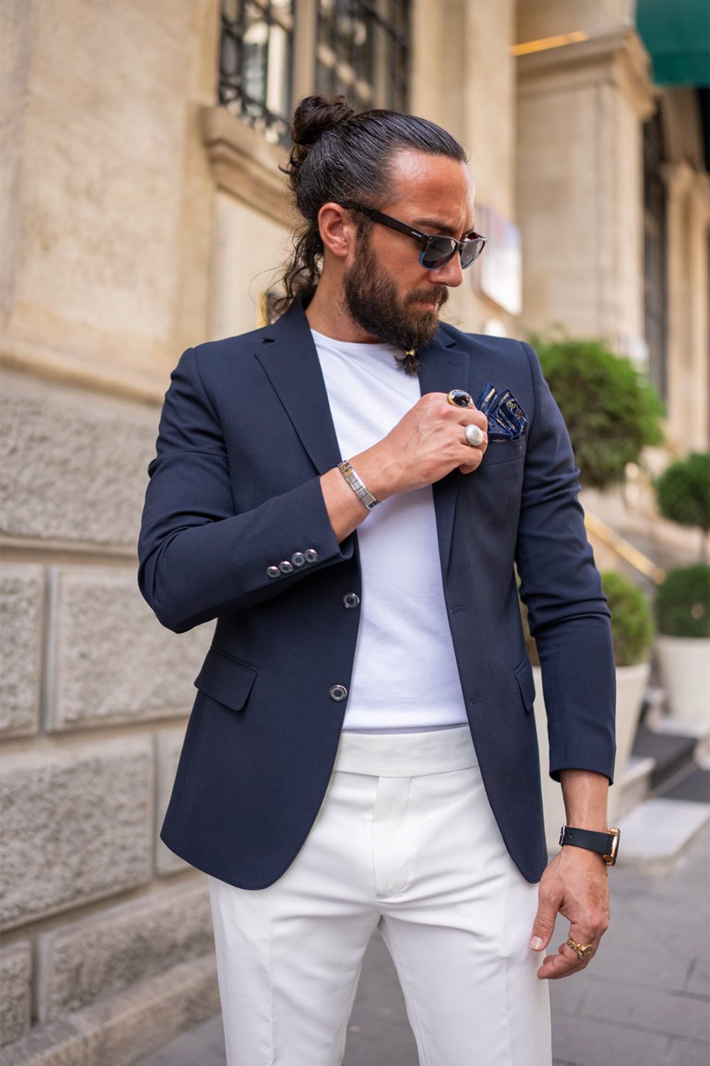 Mazonni men's navy jacket styled with loafers and accessories, modern formalwear for warm seasons