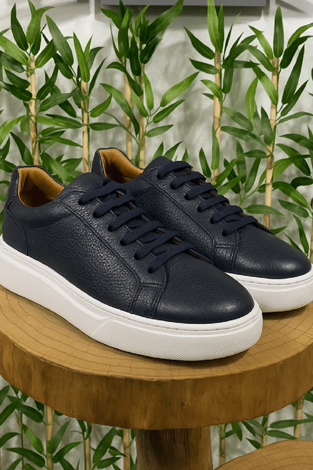 Navy blue leather sneakers for men by Mazonni with contrast white sole and modern design