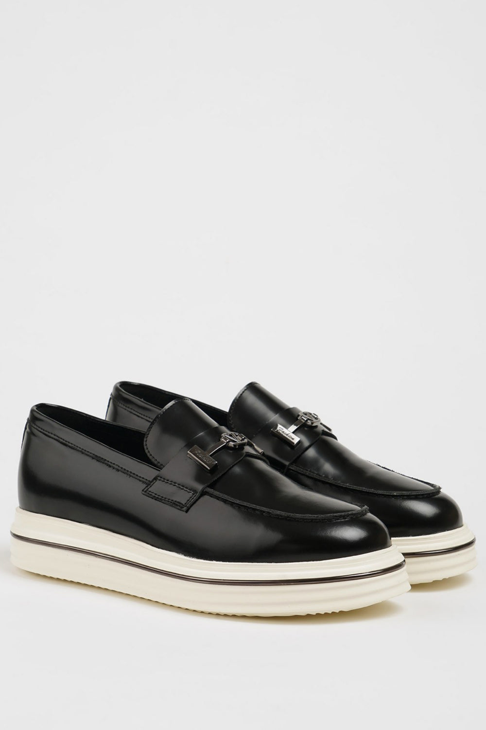 Mazonni men’s black slip-on dress shoes featuring sleek leather upper and contrast platform sole