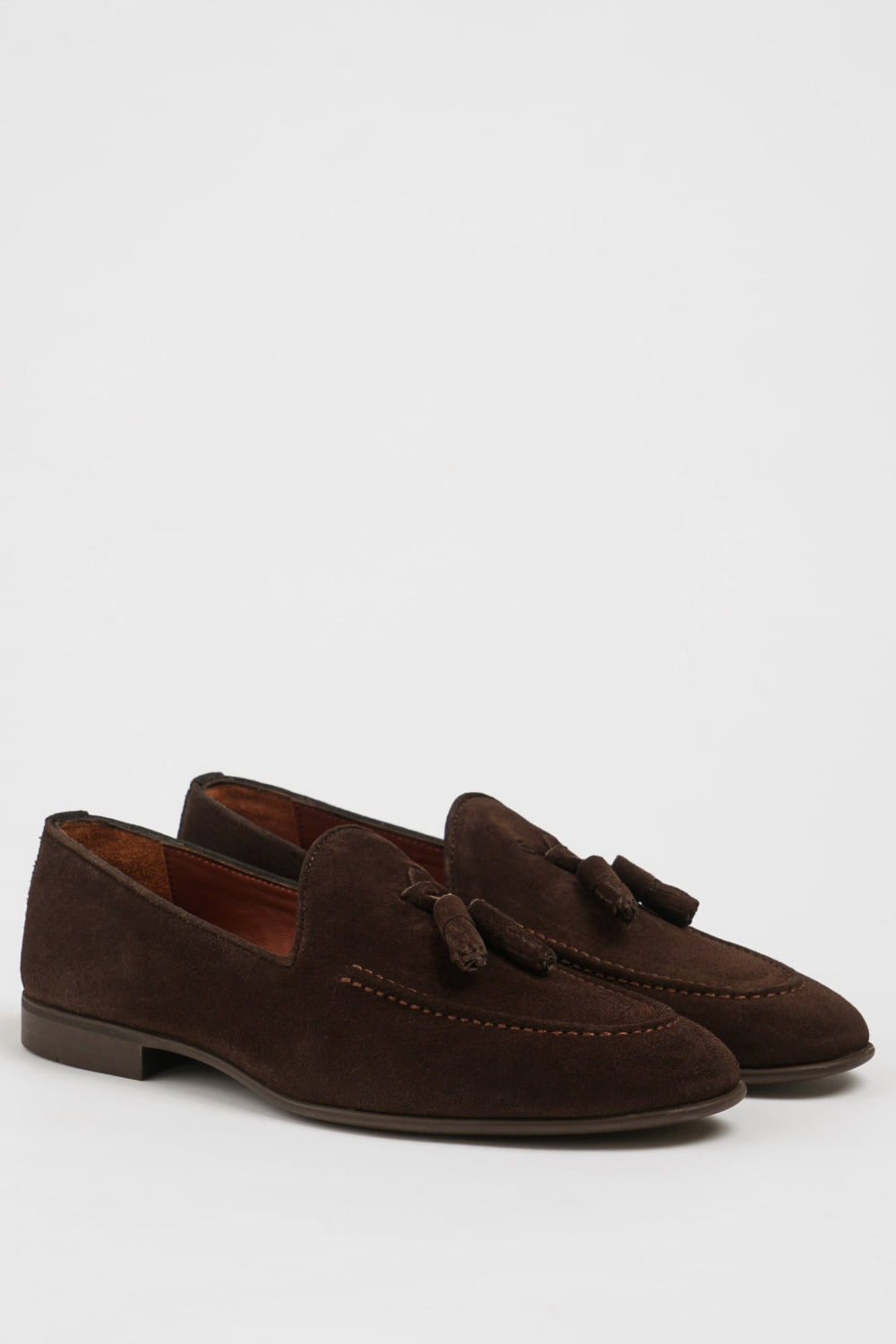 Brown suede tassel loafers for men by Mazonni with classic silhouette and leather sole
