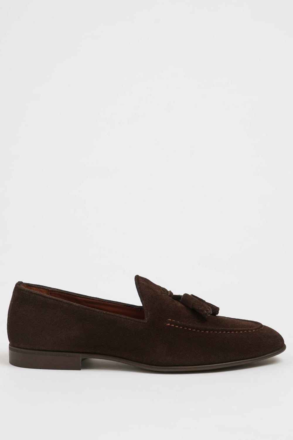 Men’s suede moccasin-style loafers from Mazonni in rich brown with stitched detail and tassels