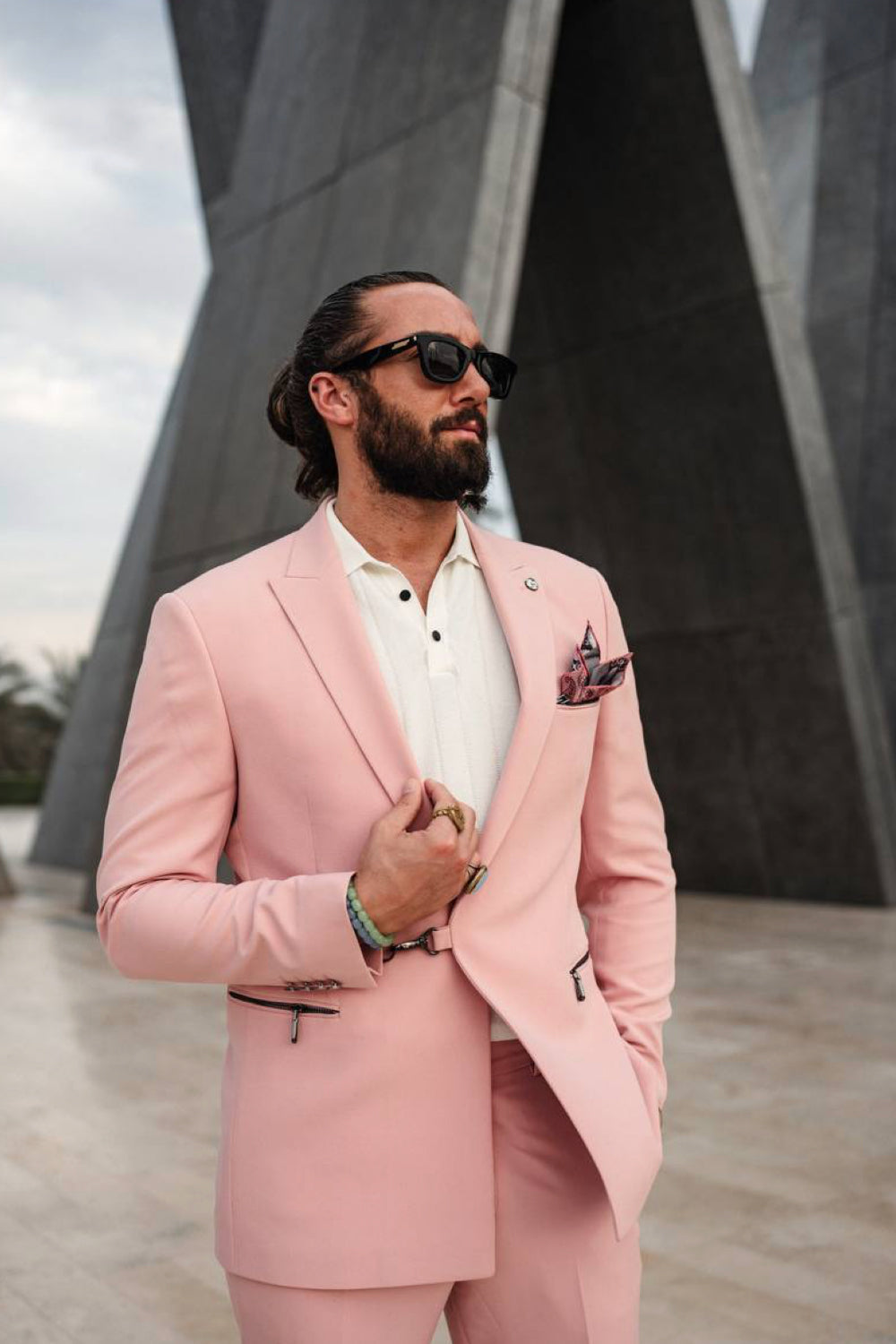 Mazonni pastel pink suit for men featuring classic tailoring and a pocket square, ideal for spring formalwear