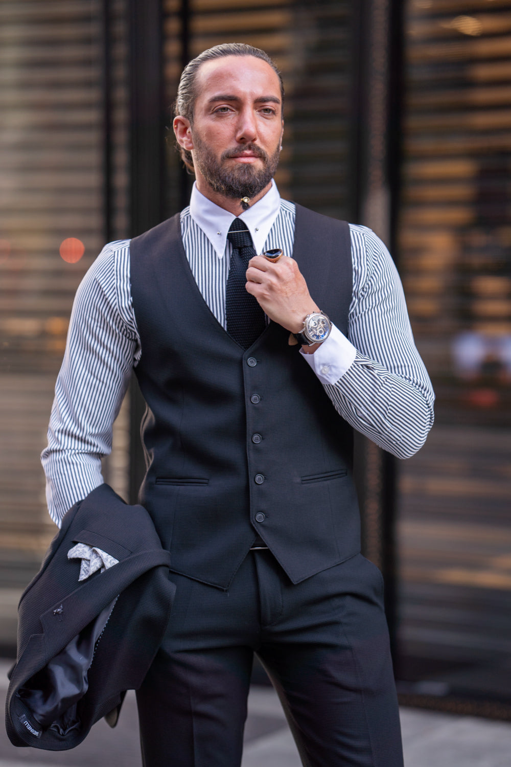 Mazonni black suit set for men with detachable jacket, emphasizing versatility for both formal and smart-casual looks