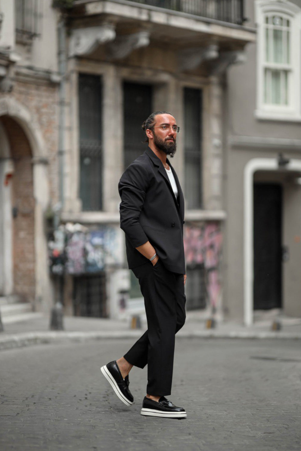 Modern men's black casual suit with loafers for smart everyday wear