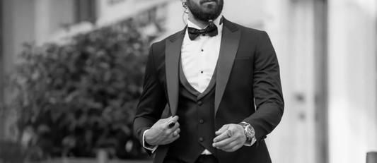 Man wearing a black tie tuxedo by Mazonni — formalwear guide for galas, premieres, and high-profile events