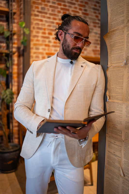 beige blazer for men by Mazonni paired with white trousers, stylish smart casual outfit for spring and summer