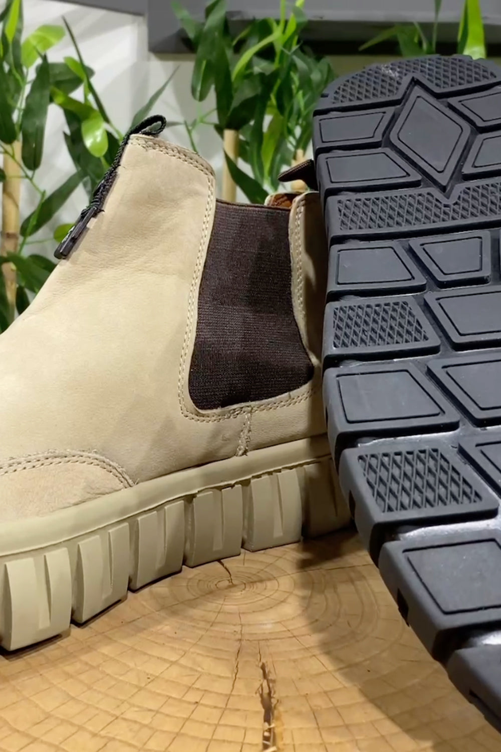 Sole view of Mazonni cream and black sneakers with textured grip outsole