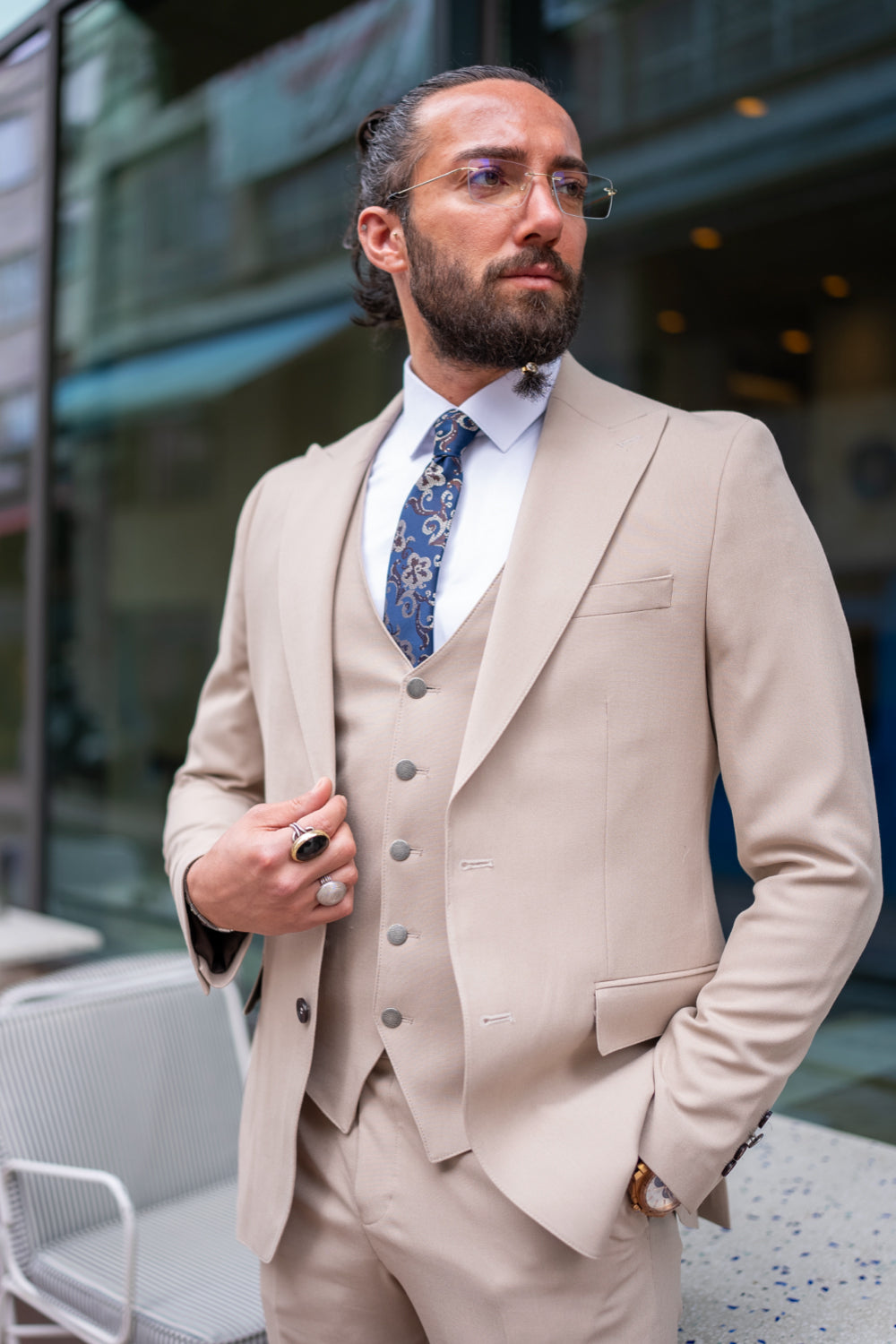 Sophisticated beige suit set for men by Mazonni with jacket, vest, and pants, styled for classy daytime events