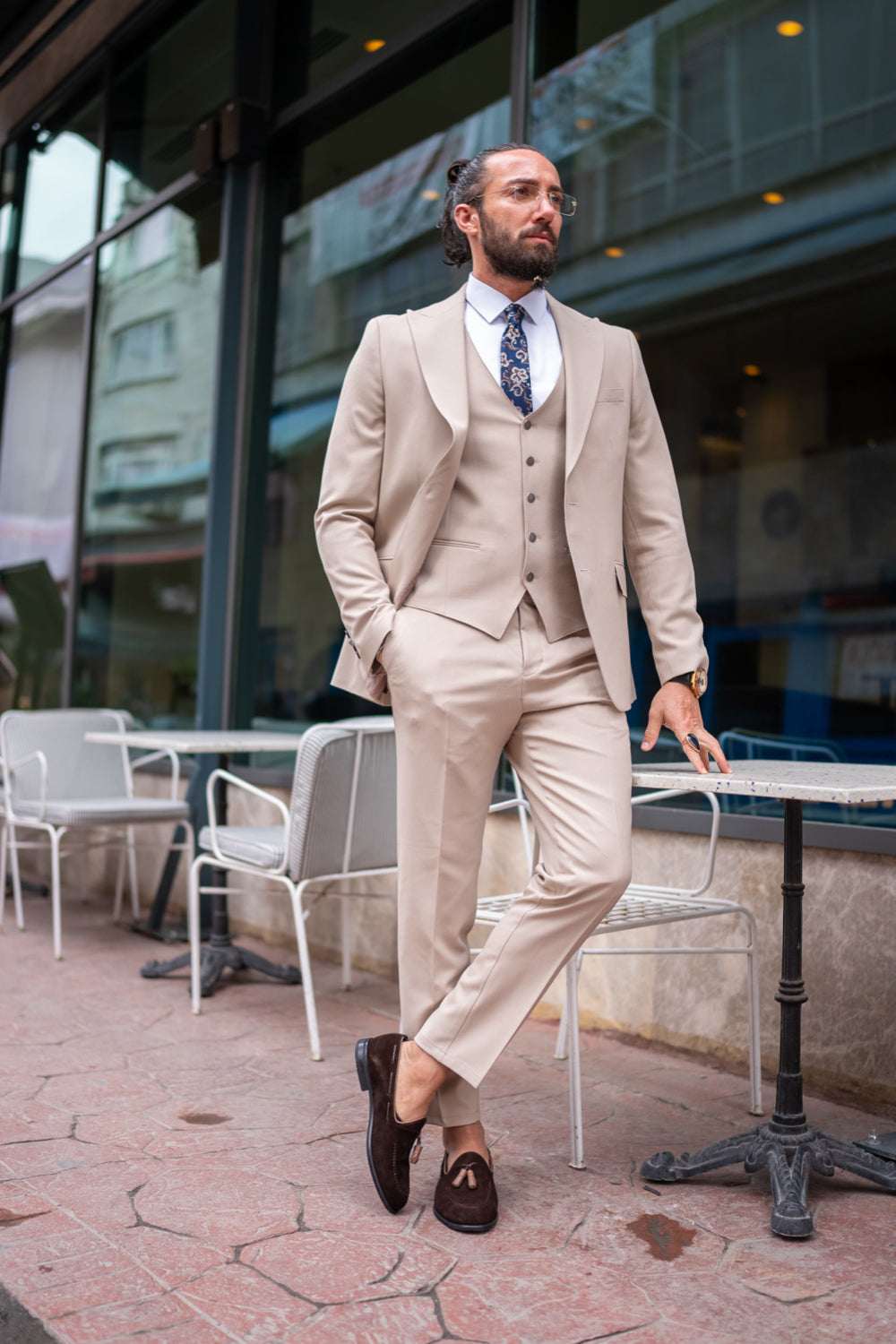 Mazonni beige three-piece suit for men featuring a classic vest and slim trousers, perfect for summer weddings or events