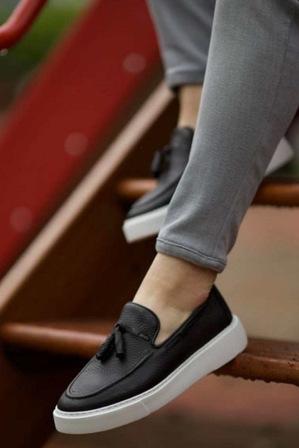 Mazonni black tassel loafers with white rubber sole for men