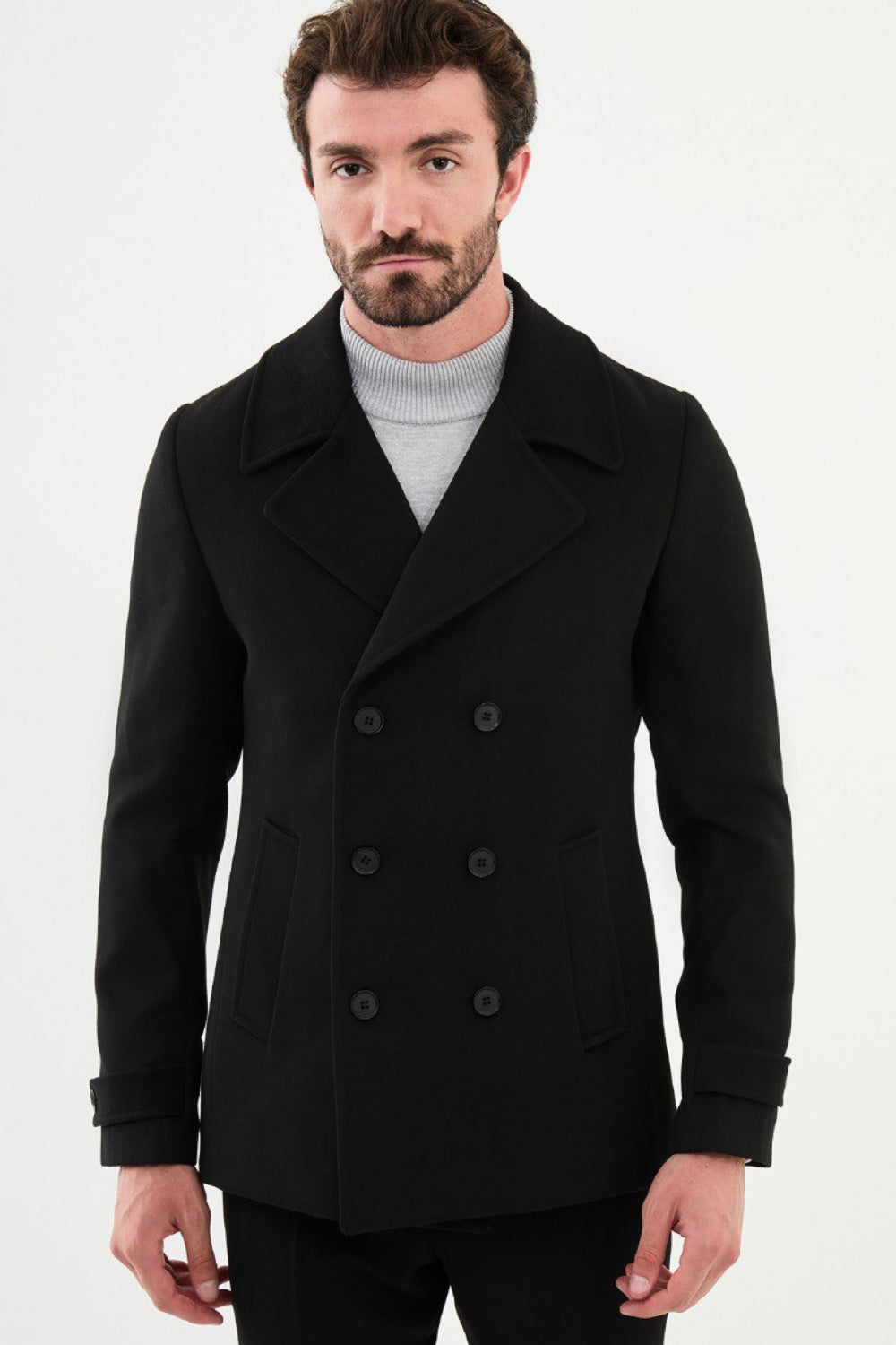 Black double-breasted Mazonni men’s jacket styled with grey turtleneck for smart casual look