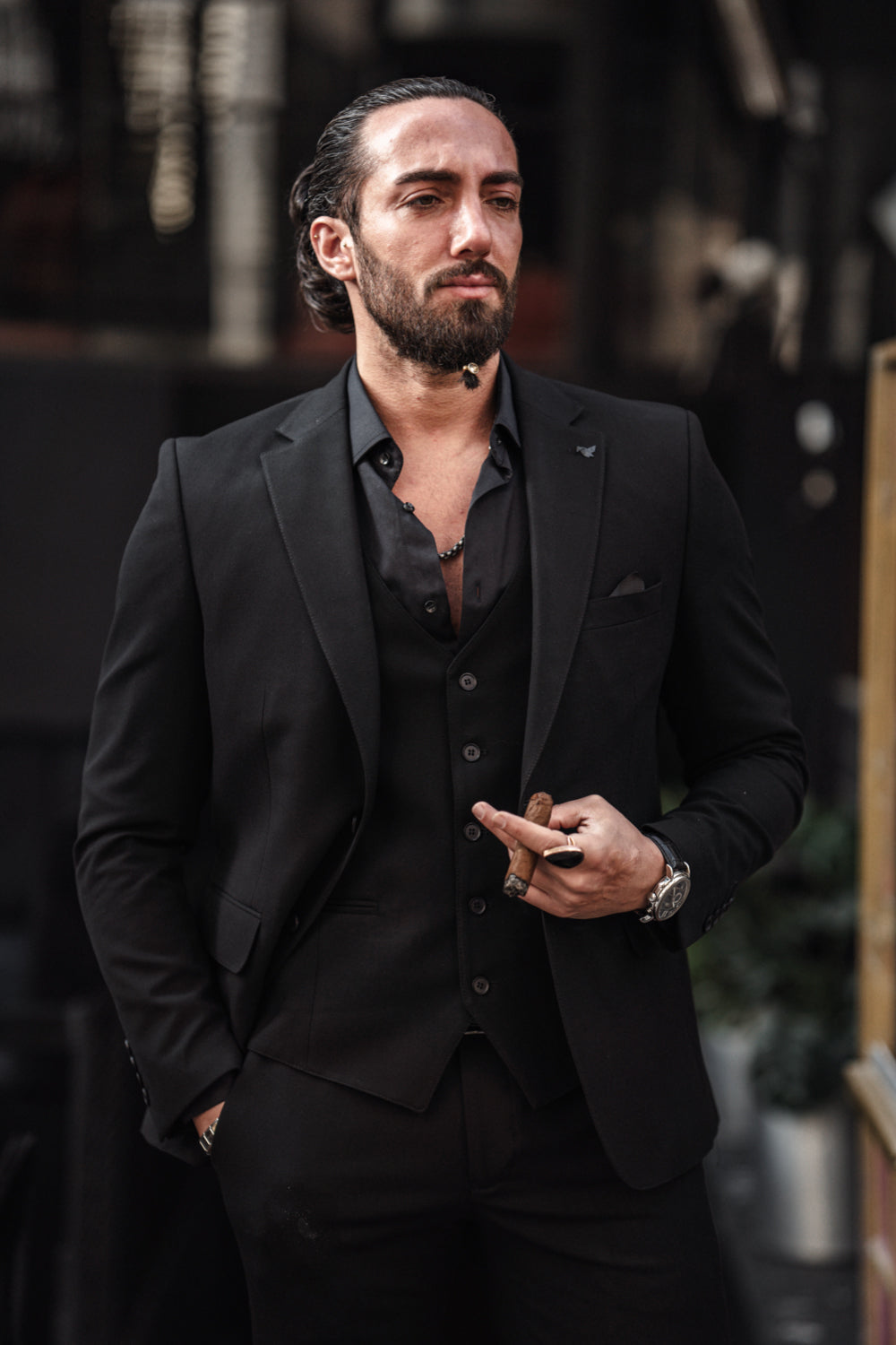 Mazonni black suit for men styled with sunglasses and no tie, perfect for upscale events or fashion-forward appearances