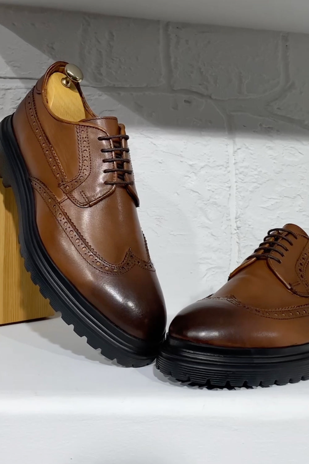 Mazonni brown leather derby shoes for men with brogue details and black rugged sole