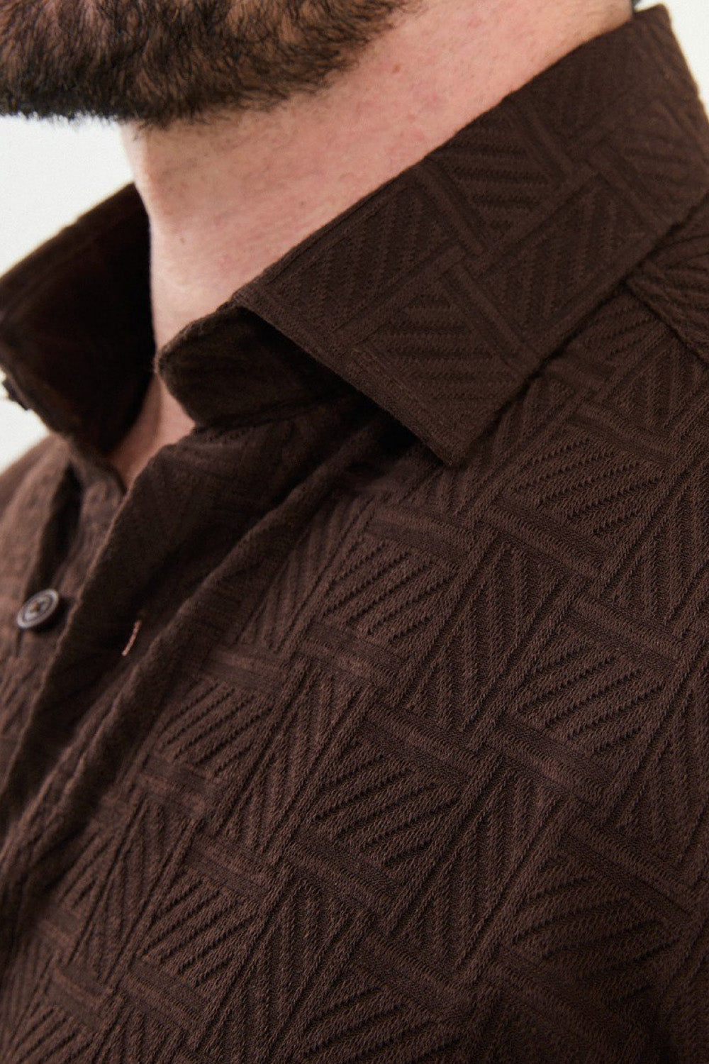 Dark brown men's shirt from Mazonni featuring embossed fabric pattern and modern tailoring