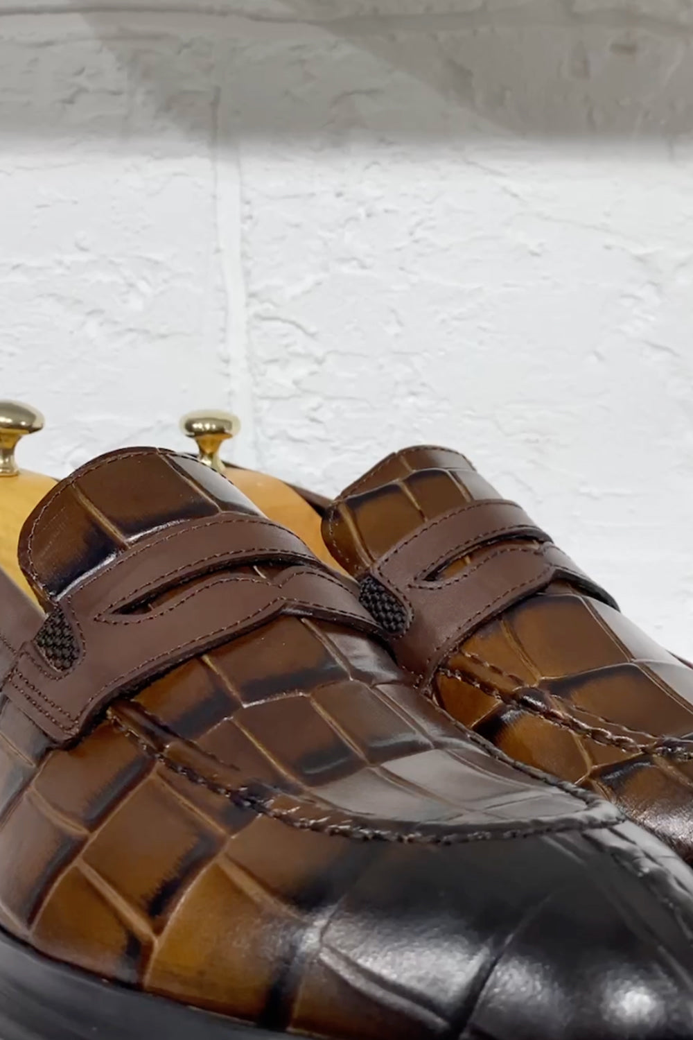 Elegant brown-black Mazonni loafers for men with wide strap and slip-resistant sole