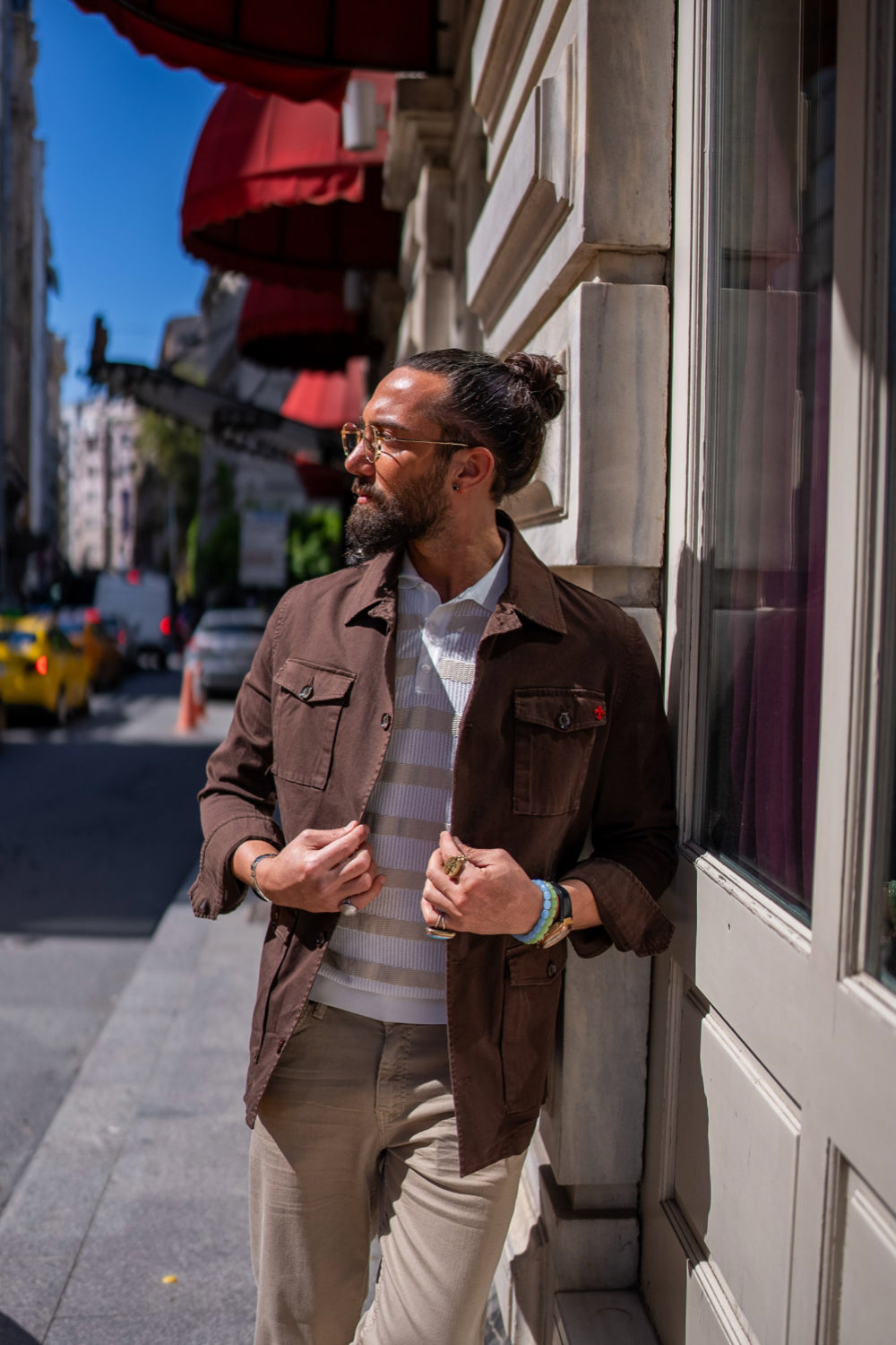 Brown Mazonni men’s jacket styled with beige pants – smart casual streetwear look