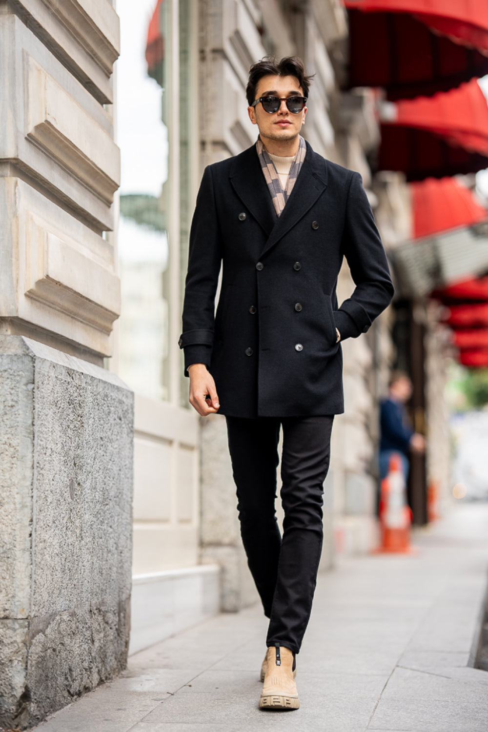 Elegant double-breasted Mazonni coat with a tailored fit, perfect for a sophisticated business look.