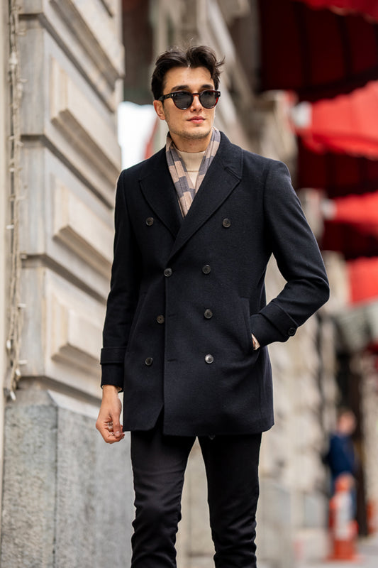 Classic black Mazonni coat showcasing refined style and modern elegance