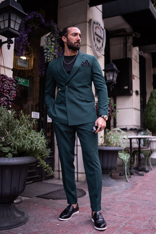 Dark green double-breasted suit by Mazonni with black t-shirt and sneakers for a modern streetwear look