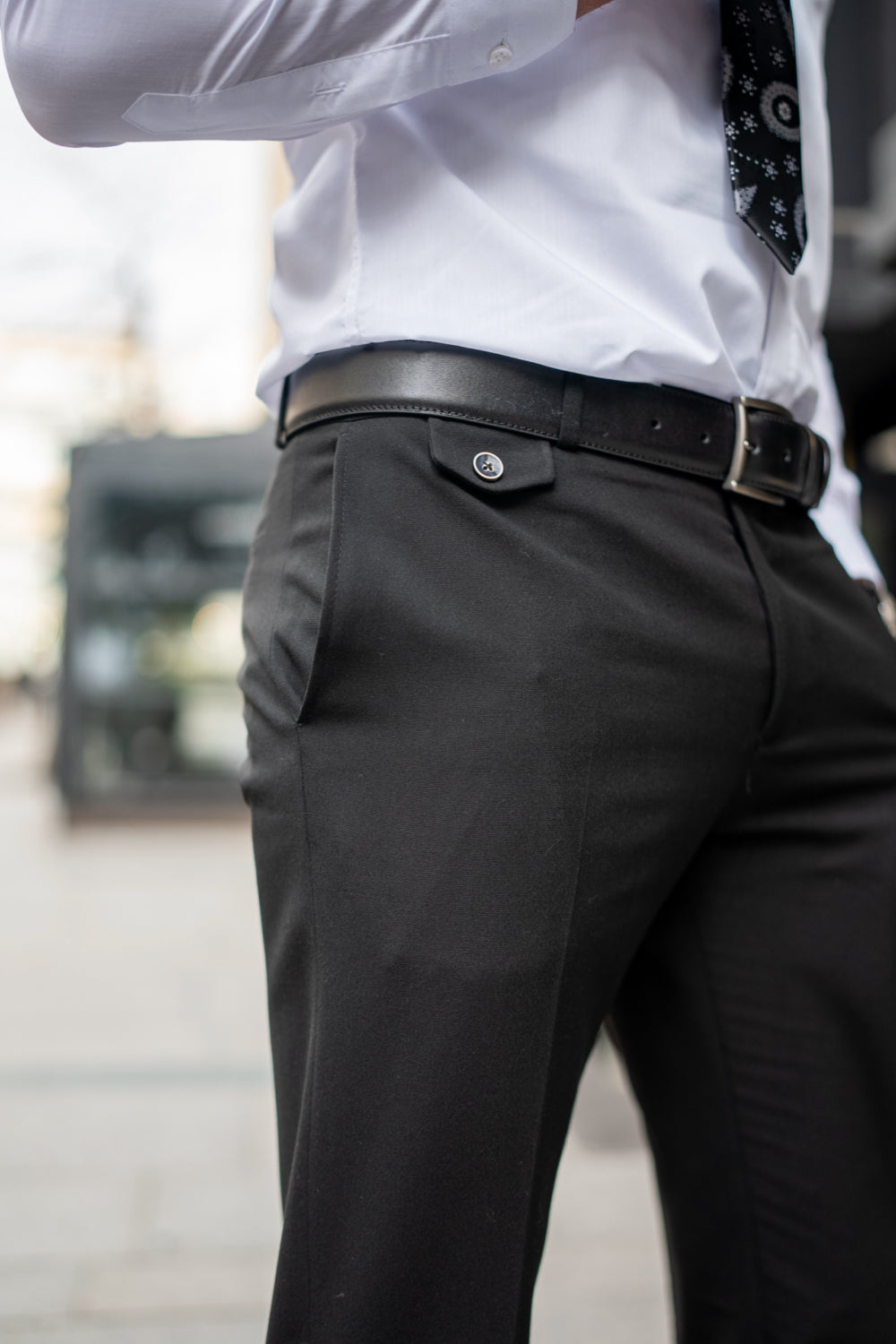 Mazonni men’s charcoal slim-fit trousers featuring belt loops and sharp tailored cut