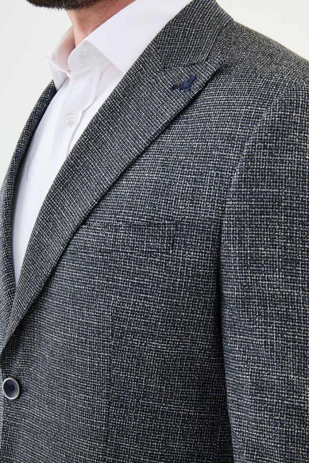Close-up of dark grey Mazonni blazer with woven texture and structured lapel – modern business casual jacket for men