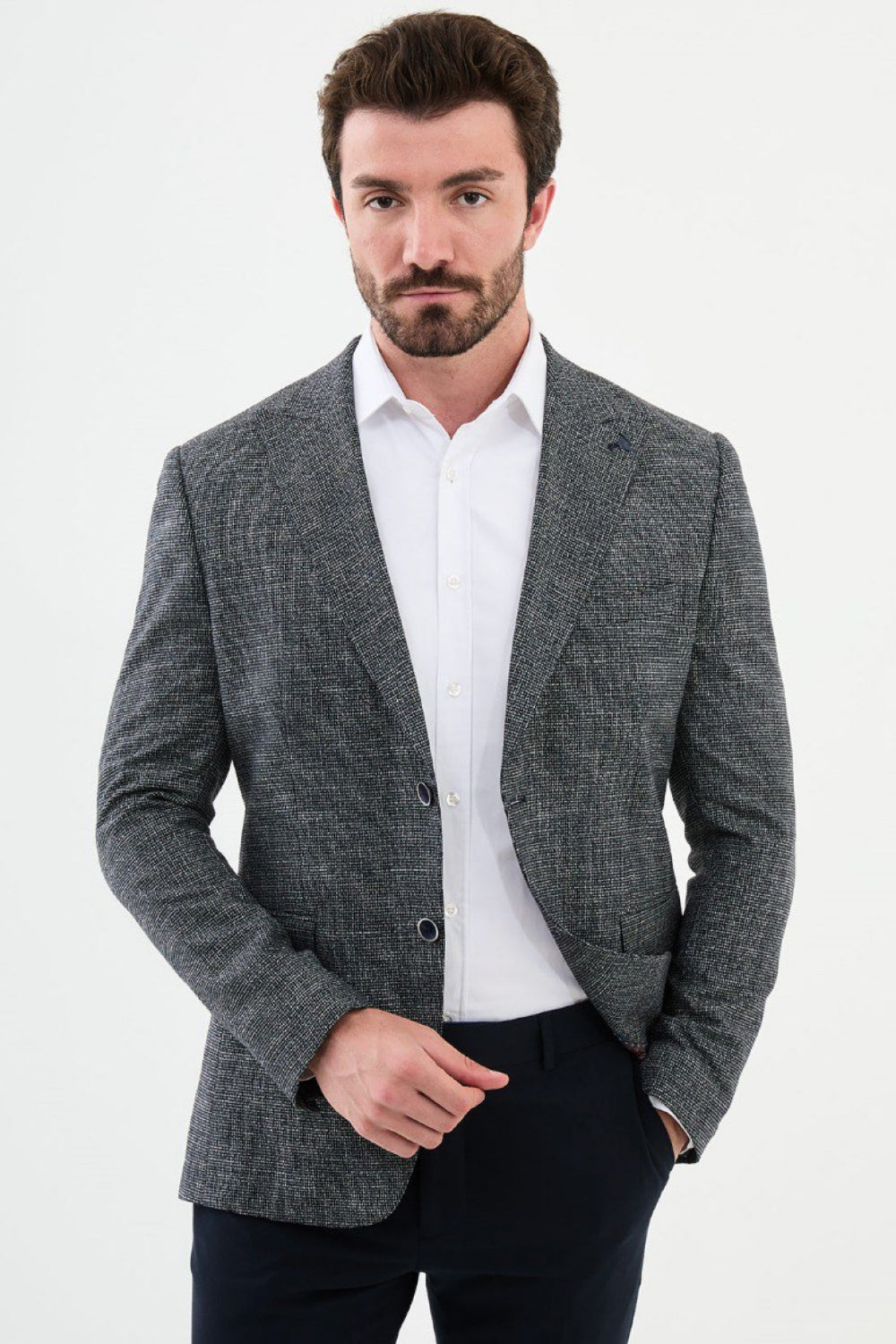 Dark grey textured men’s blazer by Mazonni styled with white shirt – versatile formal blazer for office and events