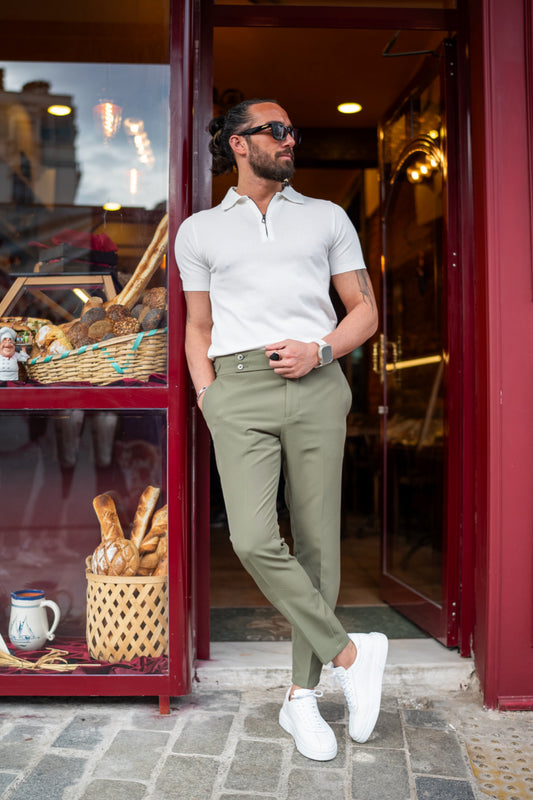 Light olive green trousers for men by Mazonni styled with white polo shirt and sneakers