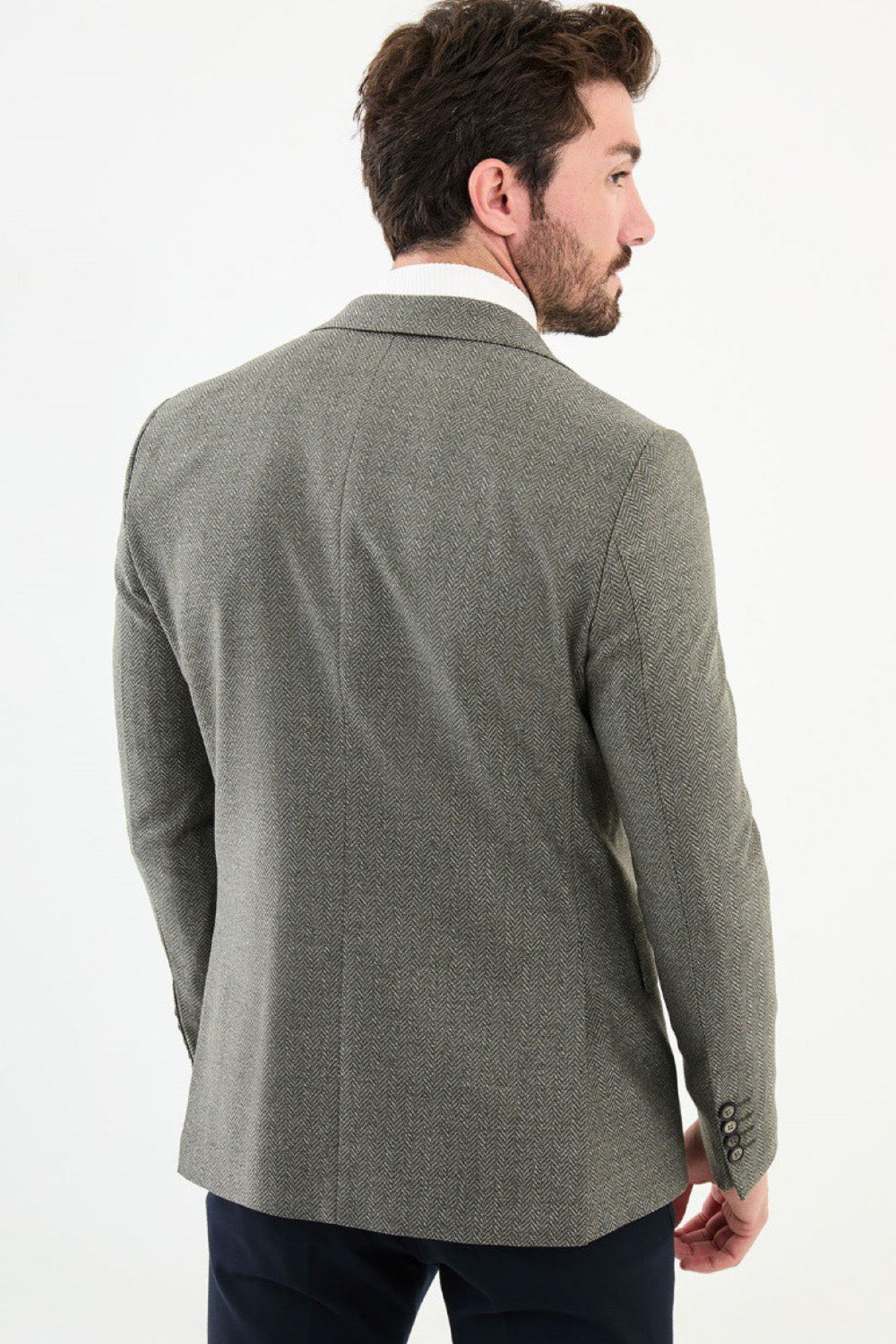 Back view of light olive green Mazonni blazer highlighting slim fit tailoring – versatile men’s blazer for business and events