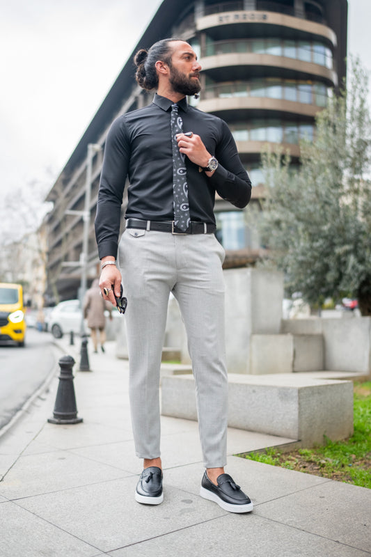 Light grey dress pants for men by Mazonni styled with black shirt for smart casual look