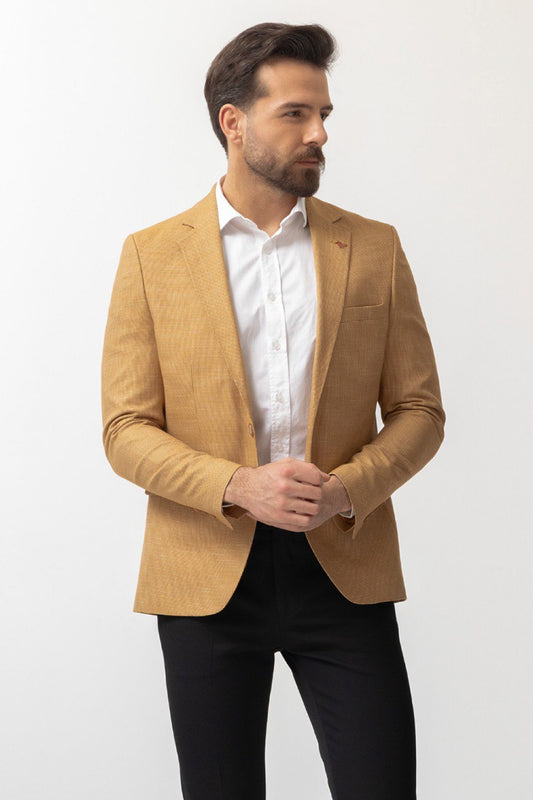 mustard yellow blazer for men by Mazonni, paired with white shirt and black pants for modern business casual look