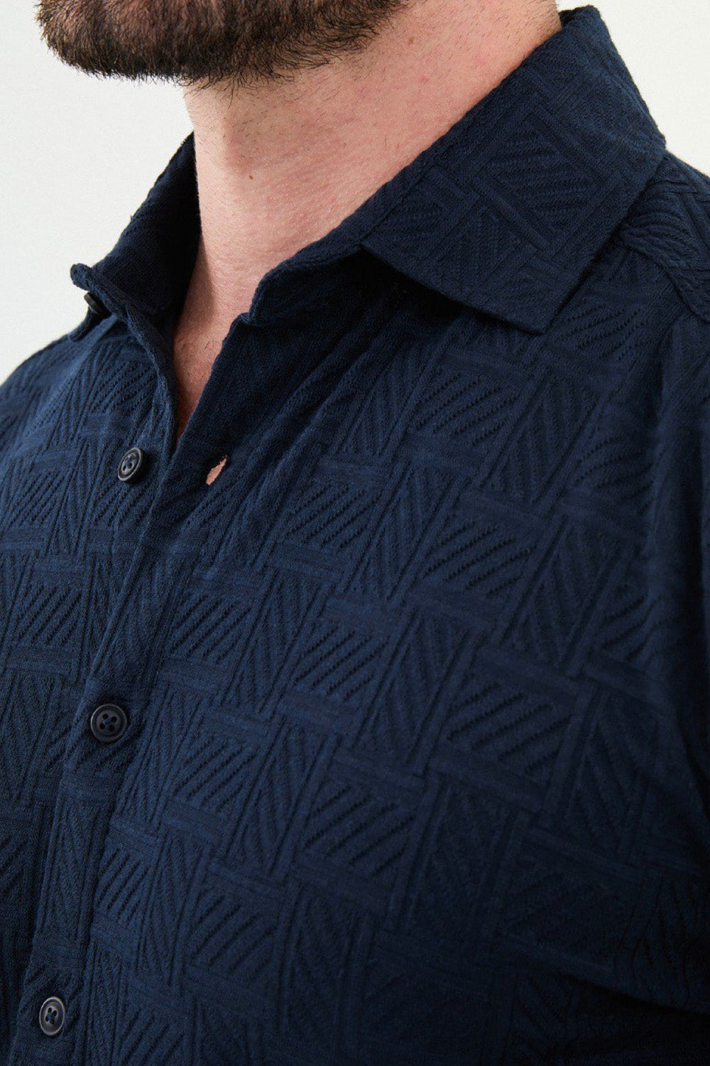 Dark blue casual shirt for men by Mazonni featuring long sleeves and pointed collar
