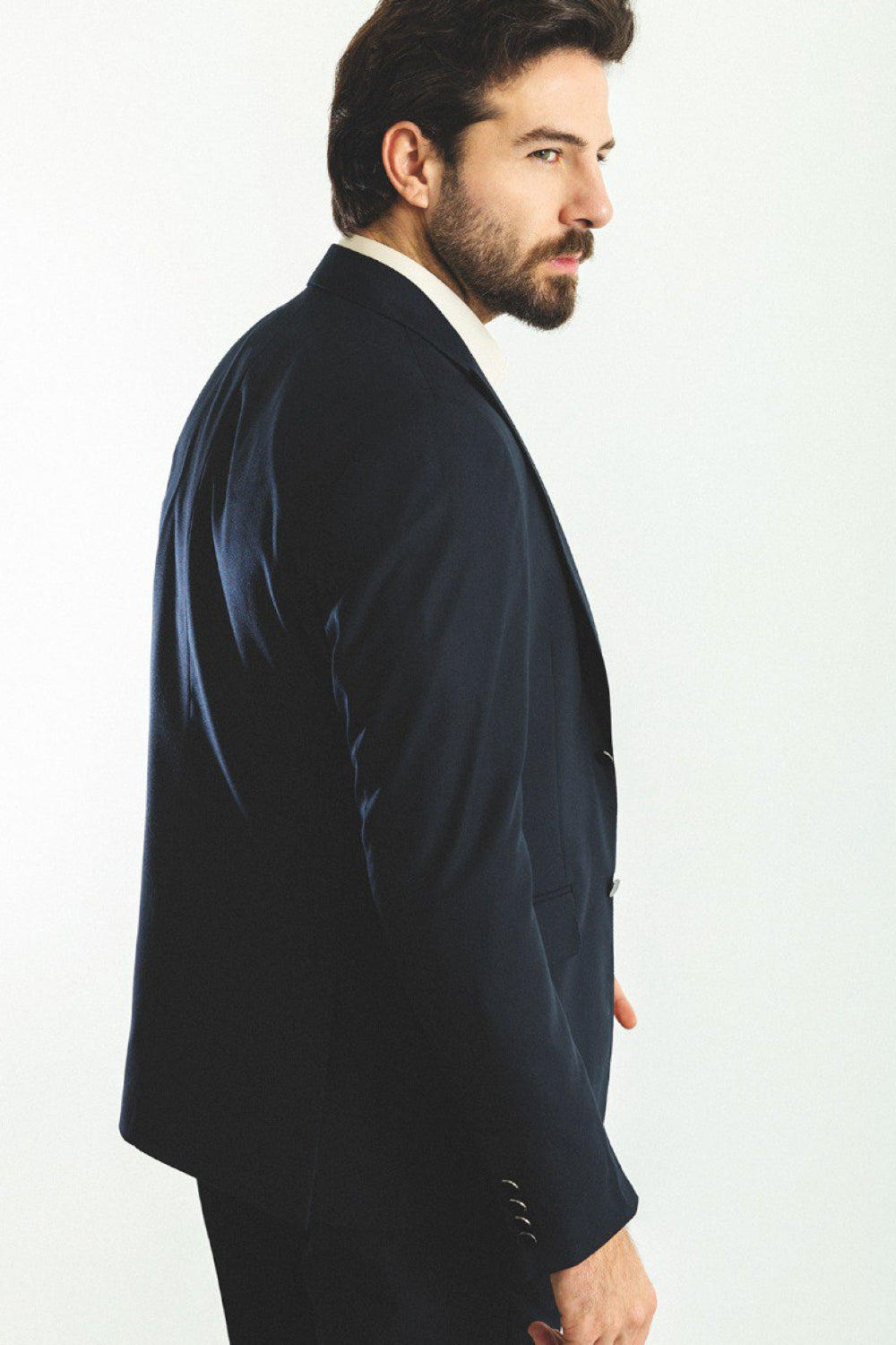 Mazonni classic navy blue suit featuring modern tailoring and soft structure, paired with dress shoes