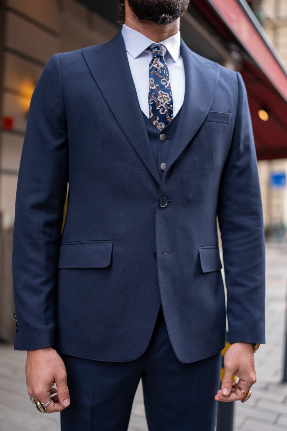 Mazonni slim-fit navy blue suit ensemble with single-breasted jacket and vest, suitable for any formal occasion