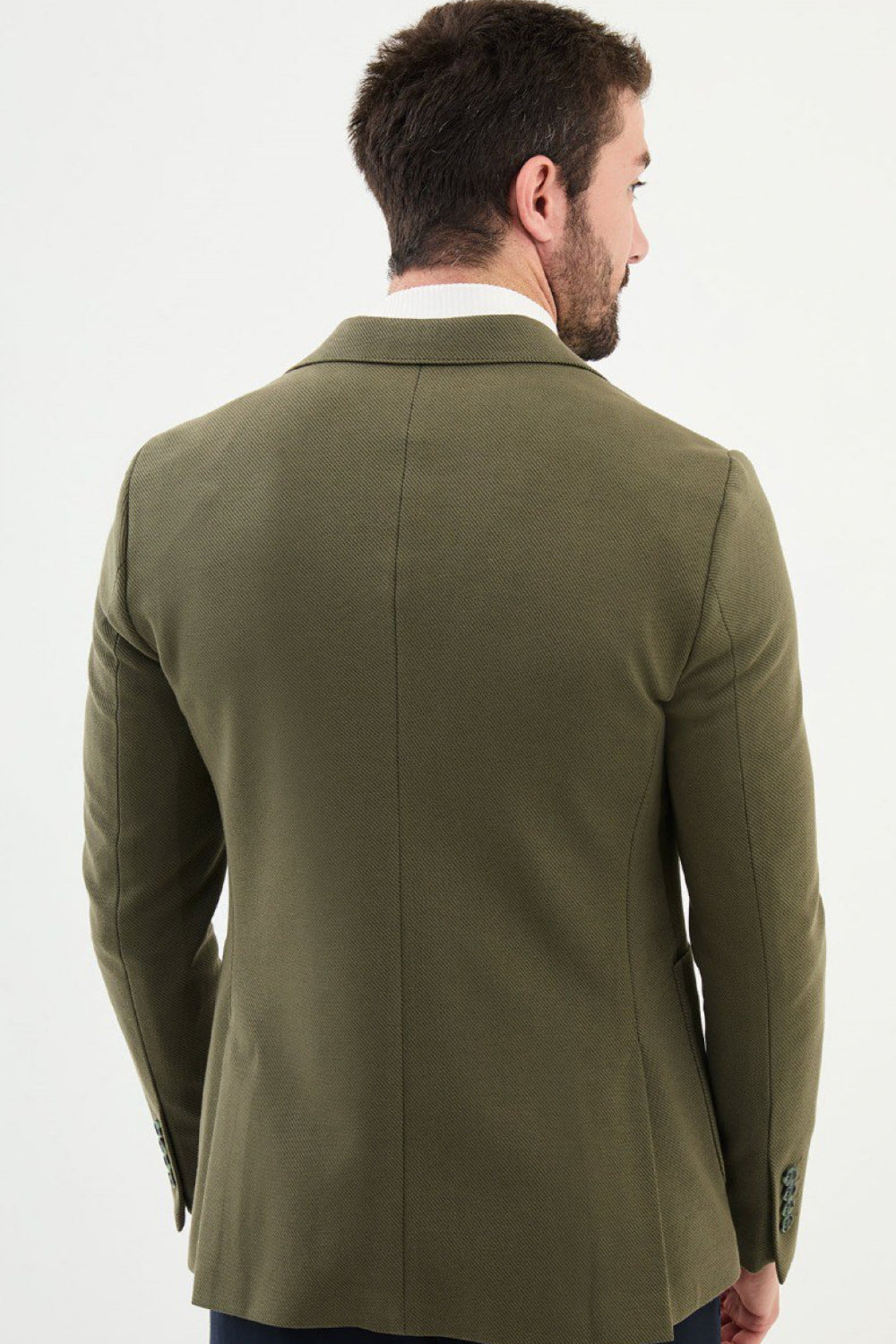 Rear view of olive green Mazonni blazer showing tailored silhouette – versatile outerwear for men’s professional or semi-formal looks