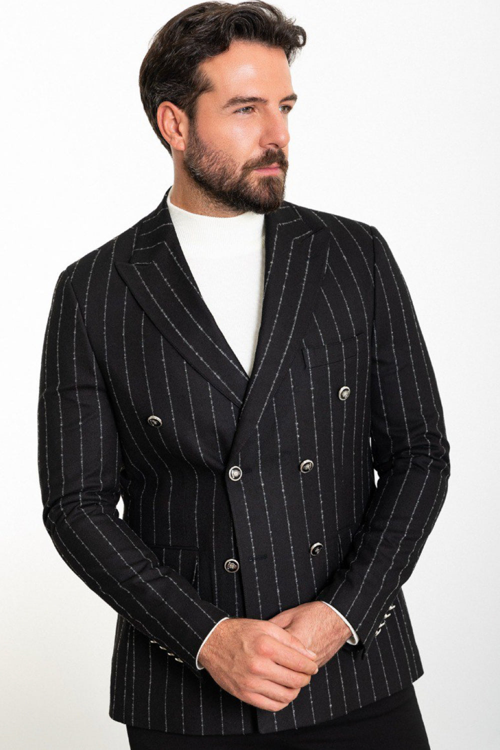 Black pinstripe double-breasted blazer for men by Mazonni styled with a white top and black trousers – bold and classic formal outfit