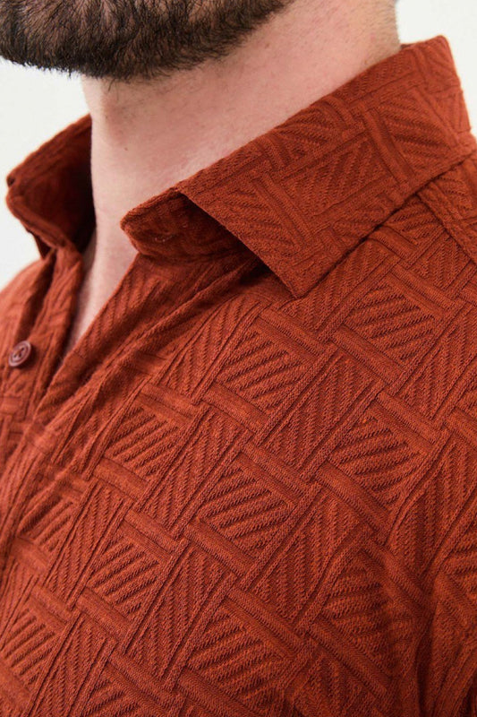 Rust-colored button-up shirt from Mazonni featuring a structured collar and long sleeves