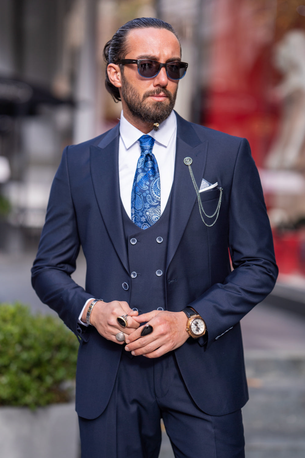 Elegant dark blue suit set for men from Mazonni styled with loafers and tie, ideal for weddings or corporate wear