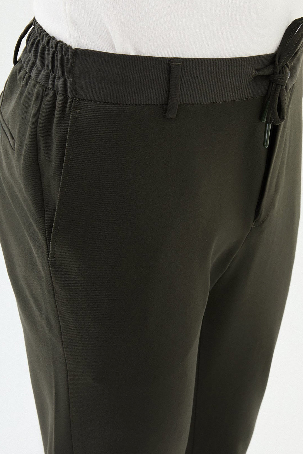 Casual olive green stretch pants by Mazonni for everyday wear