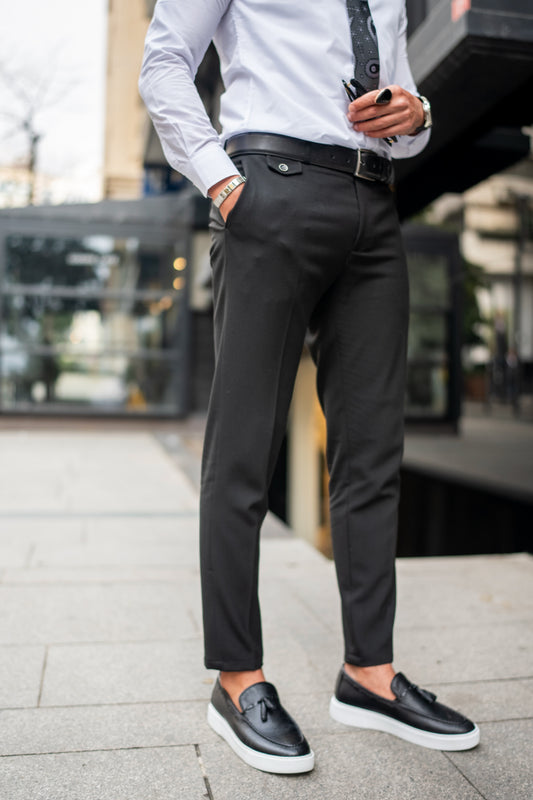 Dark grey dress pants for men by Mazonni styled with white shirt and black loafers