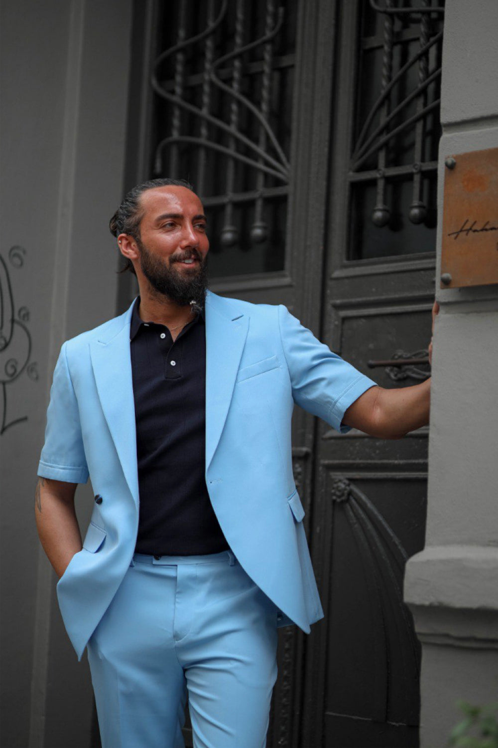 Modern tailored short sleeve blazer and pants set for men in pastel blue tone